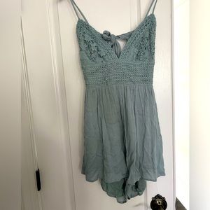 comfy and flowy minty green romper to wear anywhere you’d like